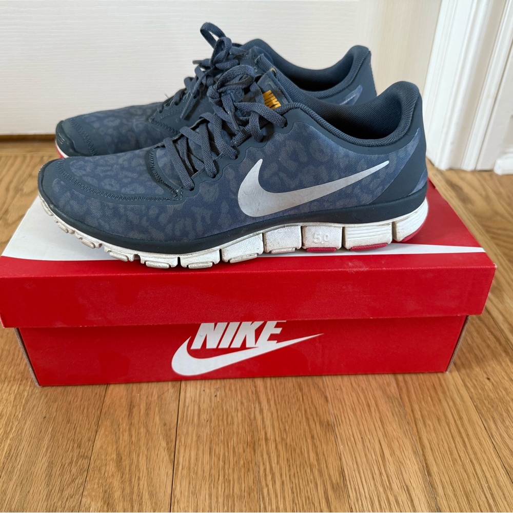 Nike Women's Dark Navy Leopard-Print Running Shoes with White Swoosh